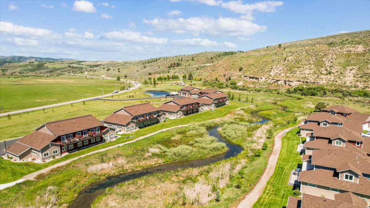 Aerial view of the Swan Valley townhouse development along Rainey Creek