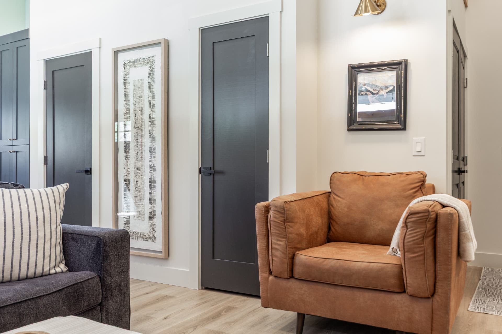 Leather armchair and gallery wall in the sitting area
